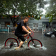 A cyclist in Beijing this summer.